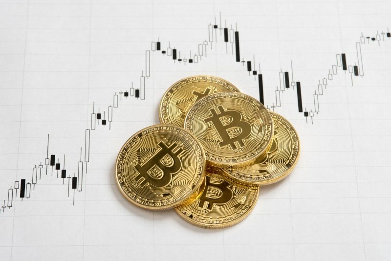 pile of bitcoins on chart